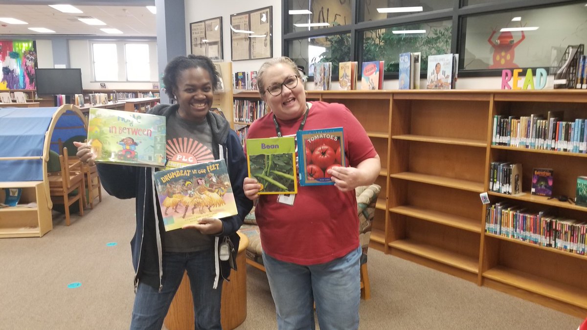 LANelsonLibrary's tweet image. Teachers checking out books for World Read Aloud Day!!!