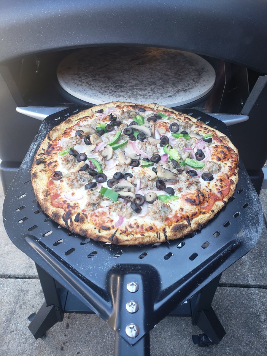 Got the pizza oven lit! Chicago style thin crust with all the good stuff on top.