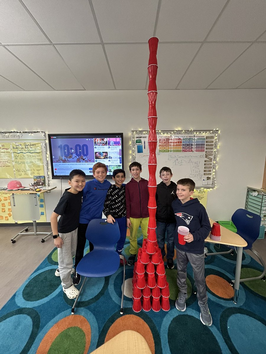 MissWolfrum's tweet photo. 100th day of school STEM challenge! This group stacked the highest 100 cup tower, measuring at 105 inches!! Amazing teamwork💯 https://t.co/9caDDeJv70