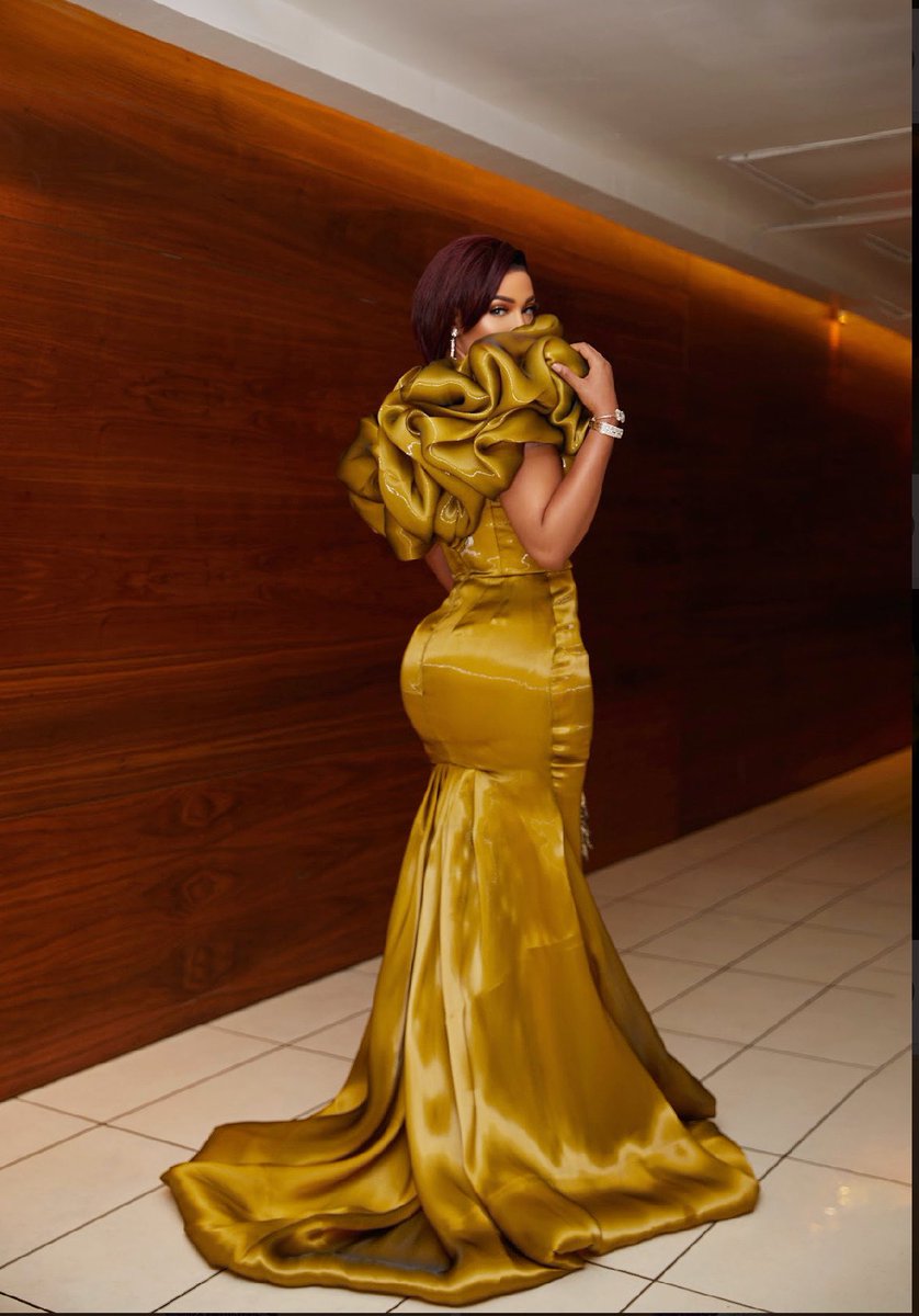 We can all agree that this dress is amazing! 

 #GoldenGlamour #BespokeBeauty #StunningStyle #FashionForward #DressedToImpress