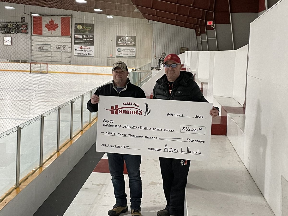 Acres for Hamiota’s board member Kevin Kirk presents Hamiota District Sports Complex with a cheque for outdoor heaters in the arena.