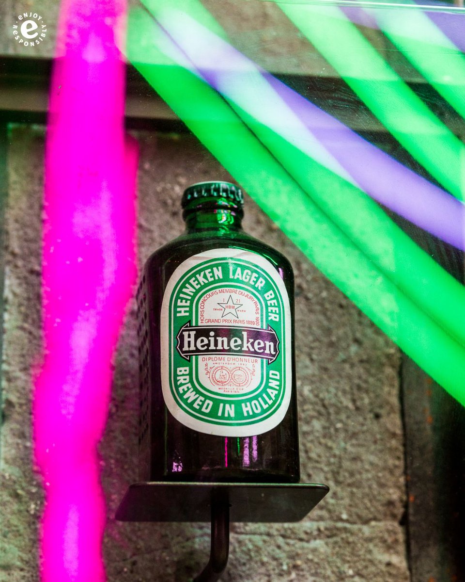 Introducing our extraordinary WoBo (World Bottle), born from the innovative mind of Freddy Heineken. Originally envisioned as a 'beer brick,' this right-angled bottle was designed for reuse in house building. Today, you can proudly own this iconic bottle and decorate your home.