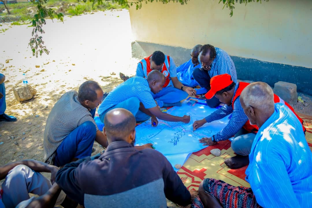 IFRCAfrica's tweet photo. Communities know their needs best! SRCS Somaliland's Enhanced Vulnerability & Capacity Assessments (#EVCA) approach, supported by @RodeKruis, is participatory, ensuring local voices are heard & solutions reflect community priorities in building #resilience for #ClimateAction. https://t.co/26pSQdi4TS