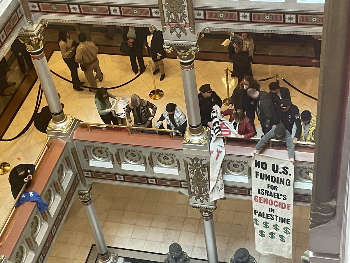 Pro-Palestinian protesters shouted, “Ceasefire now” outside chamber, but then came inside gallery and continued chant