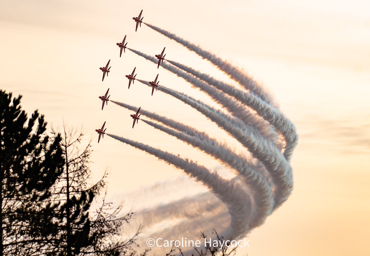 Nine red jets looking fabulous.