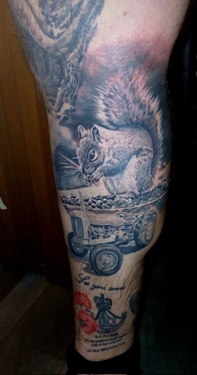 Gran and i used to sit and watch the squirrels outside her room so what better way to have a tribute than a squirrel tattoo above the tractor for Grandad