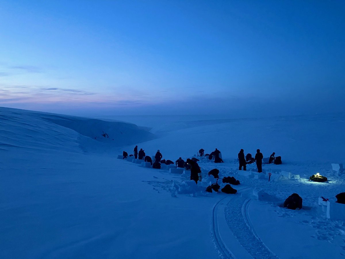 Building simple emergency shelters from snow blocks. Just after midday, still no sun yet.