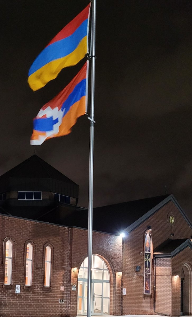 Red, blue, and orange tricolors of Armenia and Artsakh in front of an Armenian church in Canada. #Armenians #Armenia #Armenian #Artsakh #RecognizeArtsakh