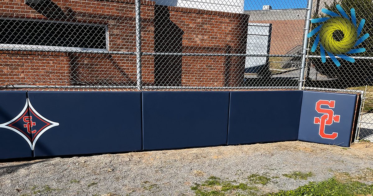 WindscreenFctry's tweet image. Vinyl-covered #backstoppadding with #customlogos enhances #playersafety by providing effective impact absorption during #baseball games. To get durable and customizable backstop padding for your field, call The Windscreen Factory at (888) 619-2228 today.