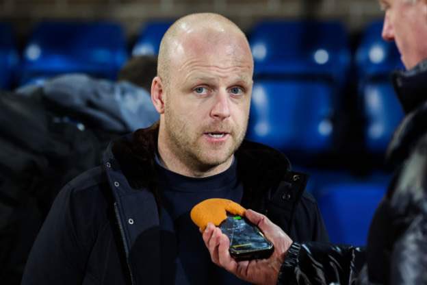 Try to justify Scottish football to folk down south then you see a photo of Steven Naismith getting interviewed after the game on a broken phone with an orange peel wrapped round it