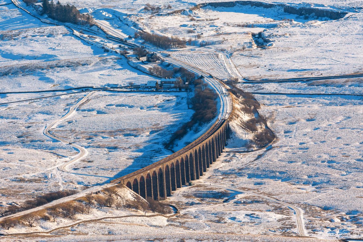 Has anyone got snow yet in the #YorkshireDales? ❄️ Here's one we did earlier - Ribblehead Viaduct taken from #Whernside a few weeks ago. 📸 With thanks to Tom Kolour #Dales #Ribblesdale #RibbleheadViaduct #BattyMoss #Snow #UKSnow #WinterVibes