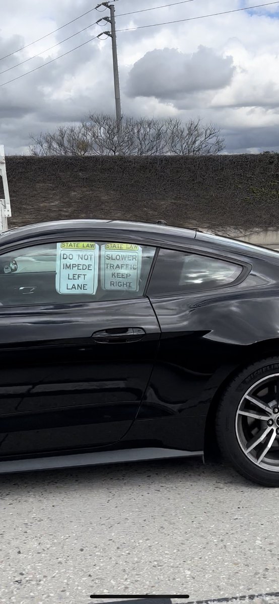 This man was on the 5 freeway today doing a public service. Pulling up next to cars moving slow in the passing lane. WHO IS HE? I watched him busy out the signs and roll them up in the window. THANK YOU SIR 🤣🤣🤣🤣🤣