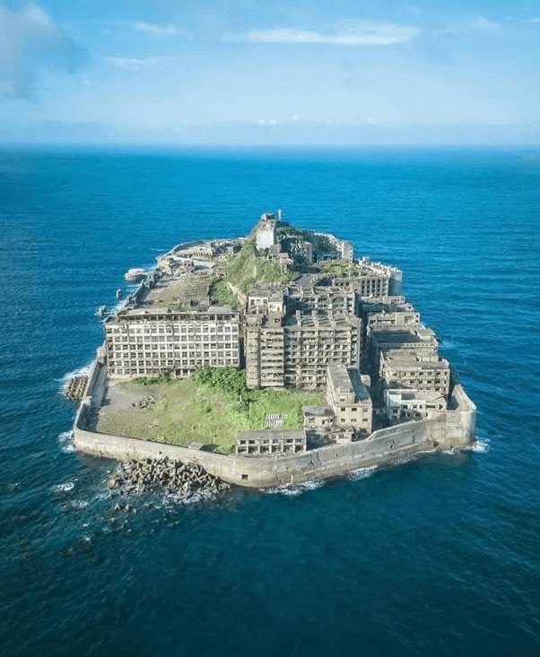 Gunkanjima Island - Nagasaki, Japan. Once the most densely populated place in the world, this island is now a ghost town.
