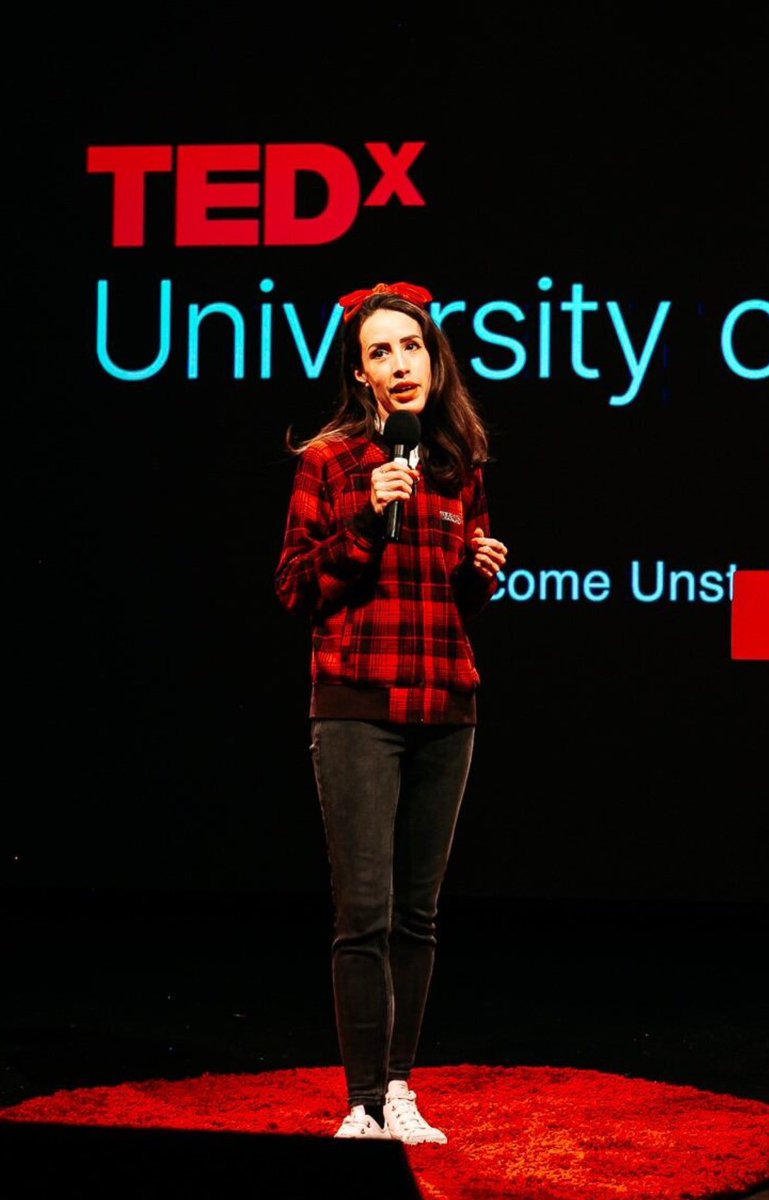 The pro photos of <a href="/TEDxUofSalford/">Tedxuniversityofsalford</a> by <a href="/WeKrazyUK/">We Krazy</a> are 🔥 Love this one! Action shot and my red bow was the right accessory choice! ❤️ #presenting <a href="/SalfordUni/">University of Salford</a> <a href="/MediaCityUK/">MediaCityUK</a>