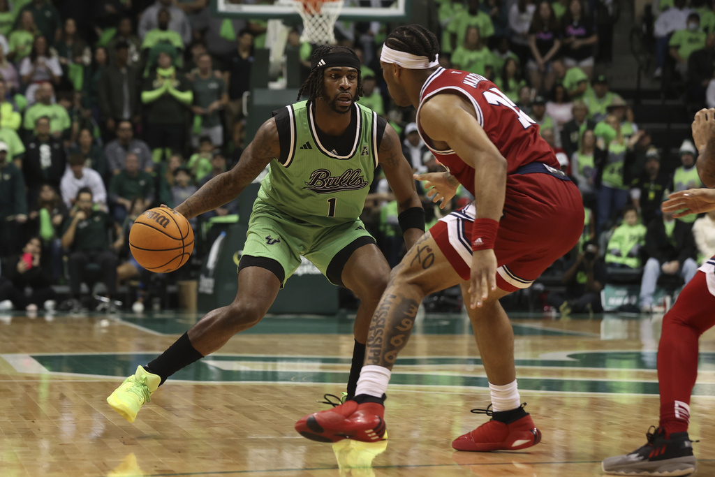 WFLA's tweet image. “I have never felt so much energy.&quot; 🏀

Excitement remains high for USF basketball&apos;s continued success amid 12-game win streak | @WFLAKaren reports: bit.ly/3SLZrKF