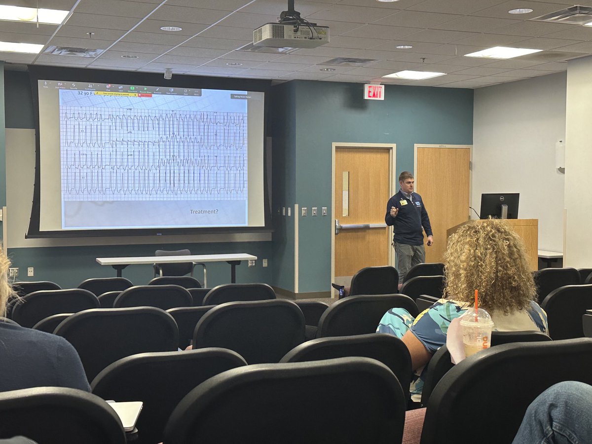 IMMCEMResident's tweet photo. ⁦@NK_irish⁩ giving a little guest lecture ⁦@Iowa_EM⁩ on cardiology board review…who can name that bizzare ekg?! https://t.co/44km0p14PH