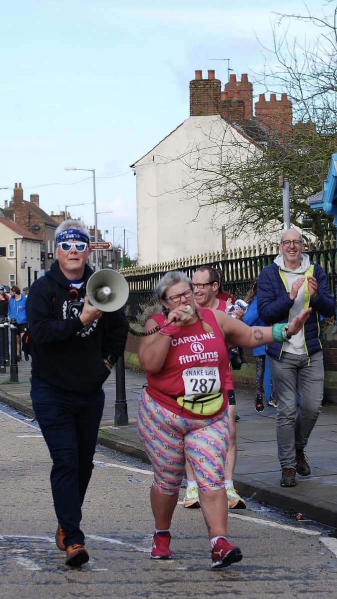 Final runner at #snakelane10 singing her way to the finish line! Don’t stop believing