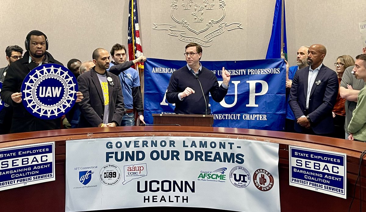 AFT Connecticut (@aftct) on Twitter photo Countering <a href="/GovNedLamont/">Governor Ned Lamont</a>'s #AusterityBudget <a href="/UCHCAAUP/">UCHC-AAUP</a> bldg rep Michael Badwin says "<a href="/UConnHealth/">UConn Health</a> = CT's largest single source of new drs & dentists; 70% of med school grads eventually practice here." #FundOurFutureCT <a href="/AFTUnion/">AFT</a> <a href="/AFTHigherEd/">AFT Higher Ed</a> <a href="/AFT_PE/">AFT Public Employees</a> <a href="/AFTHealthcare/">AFT Healthcare</a> <a href="/AAUP/">American Association of University Professors</a> <a href="/SEBAC_CT/">SEBAC - State Employee Bargaining Agent Coalition</a> Countering <a href="/GovNedLamont/">Governor Ned Lamont</a>'s #AusterityBudget <a href="/UCHCAAUP/">UCHC-AAUP</a> bldg rep Michael Badwin says "<a href="/UConnHealth/">UConn Health</a> = CT's largest single source of new drs & dentists; 70% of med school grads eventually practice here." #FundOurFutureCT <a href="/AFTUnion/">AFT</a> <a href="/AFTHigherEd/">AFT Higher Ed</a> <a href="/AFT_PE/">AFT Public Employees</a> <a href="/AFTHealthcare/">AFT Healthcare</a> <a href="/AAUP/">American Association of University Professors</a> <a href="/SEBAC_CT/">SEBAC - State Employee Bargaining Agent Coalition</a>