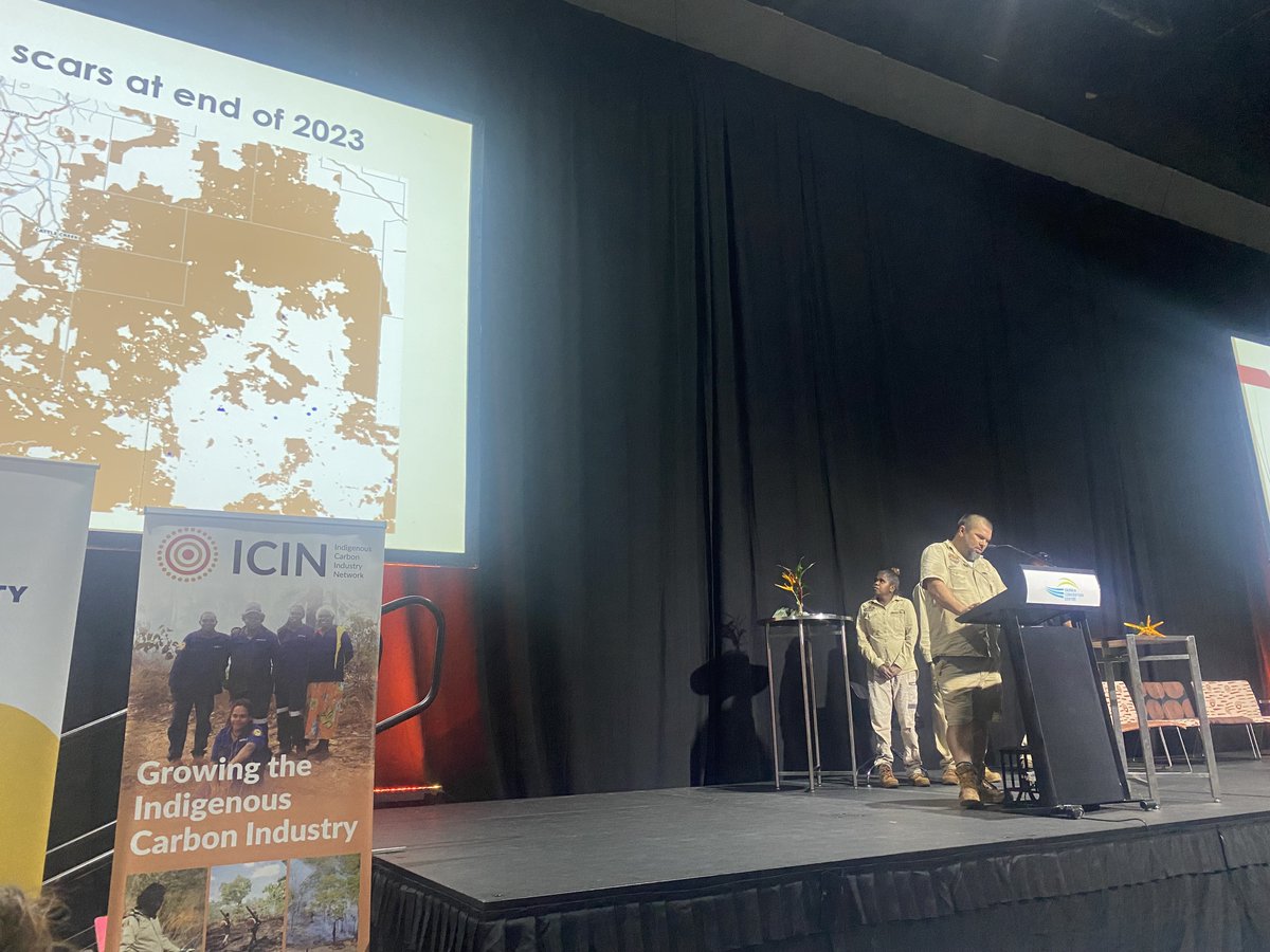 Murnkurrumurnkurru Rangers Jerome Bernard, Helma Bernard and Clifford McGinness speaking about fire management at #NASFF2024. 'The desert is rough and there are not many roads. We can use the plane to take more TOs who show us where to burn.'