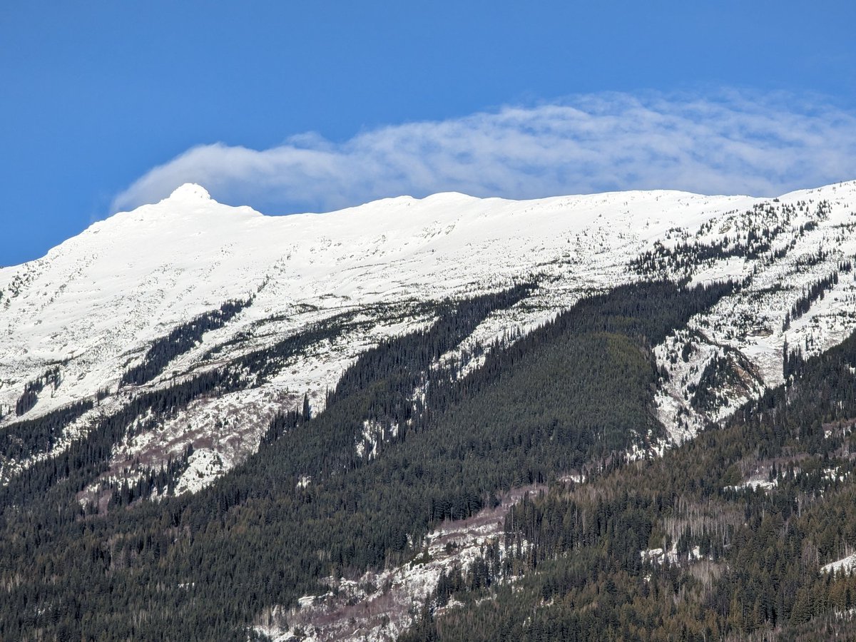 MuketyMuk's tweet photo. #Banner #Clouds and cirrus streamers heralding the approaching storm. Feb 19 #Arrow #Reservoir draw down of upper #ColumbiaRiver #OldGrowth cedar #Stumps Reflection on #Clearcuts #BCWX https://t.co/2xm7c2eOBF