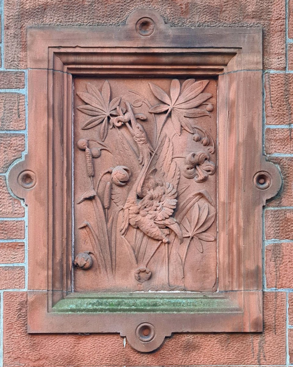 is_glasgow's tweet photo. This relief sculpture is on the late 19th Century Ross Hall in the Crookston area of Glasgow and it shows a heron eating an eel. I've got no idea why it's there, but it's a beautiful piece of craftsmenship none-the-less.

#glasgow #crookston #rosshall #architecture #sculpture https://t.co/4IJ7UGroAz