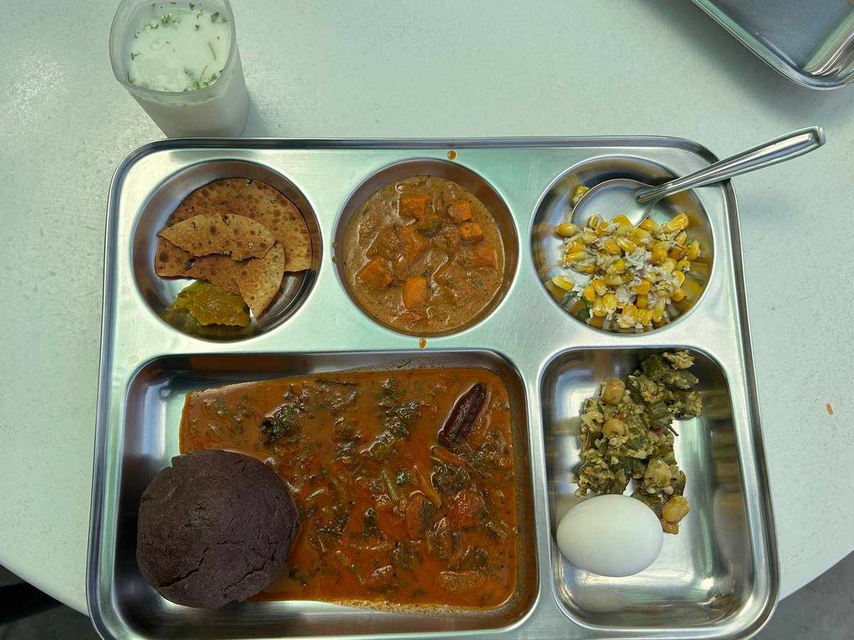 karthikrangappa's tweet photo. Perks of working at @zerodha  - this is lunch for everyone at work. ರಾಗಿ ಮುದ್ದೆ (ragi ball) and sambar 😋. https://t.co/2MS0vHcuj4