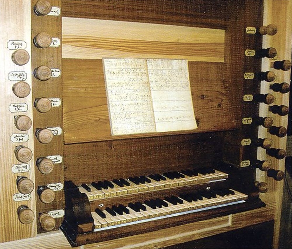 The modest organ used in Arnstadt, Germany by the 18 year-old J.S. Bach when he served as organist of the town's Protestant church from 1703 to 1707. The keyboards and draw-knobs are original. The organ loft is placed on the 3rd level of the church, far above the congregation.