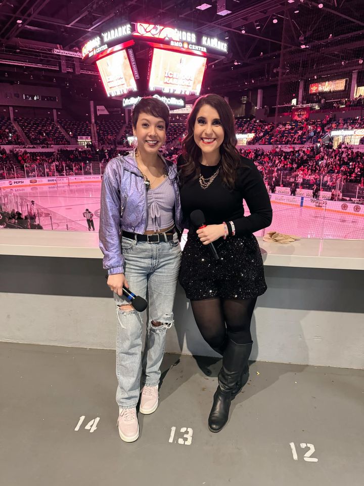 townsquaremedia's tweet photo. SPOTTED: In their ✨ Rockford IceHogs Era ✨ It was Eras Night at a recent IceHogs game and @97ZOK's Midday Michelle and Emily emceed the game together. 💜🖤🏒 https://t.co/OBtx2t0gES