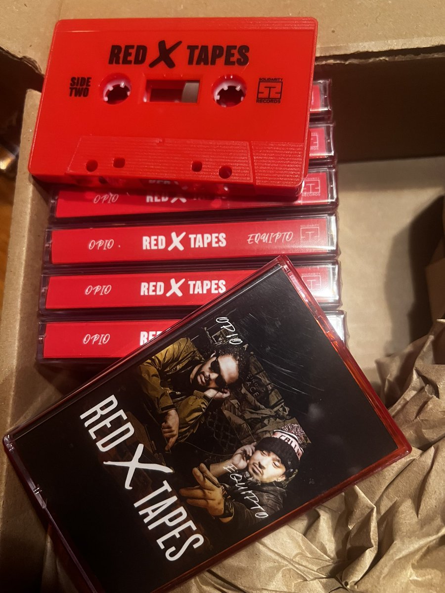 Limited Edition Red X tapes album on (red) cassette - by @EQUIPTO x @opiohierosom - featuring @DelHIERO @thegrouch @SunspotJonz @Zmantheoriginal Mike Meezy & more. Production by @Sinestro101 @XtheProfessor @BeanOne & more. Art by @zerodatastudios