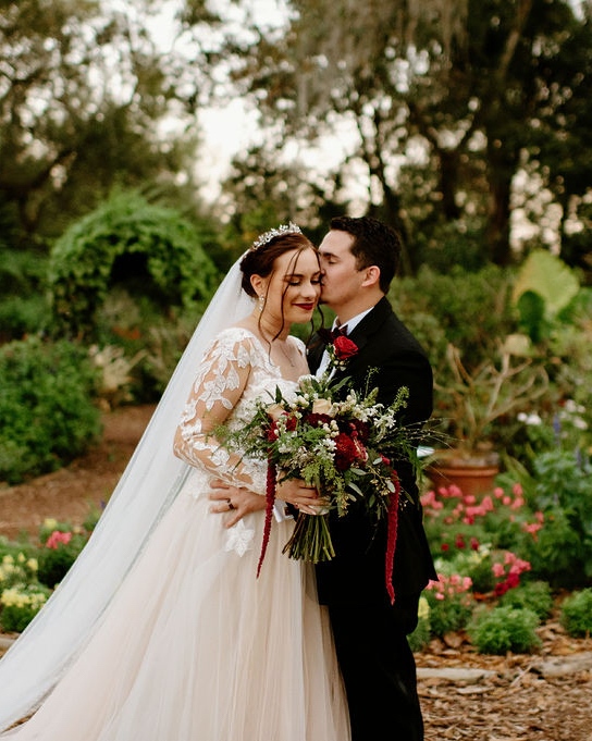 This forest fairytale wedding was dreamy. We love the rich reds from Courtney’s makeup and floral details. It was a beautiful February wedding at Mead Gardens ♥️
⁠
#WeddingDay #OrlandoWedding #RealWedding #DubsdreadCatering #OrlandoBride #SimplyEnchantedBride #SimplyEnchanted