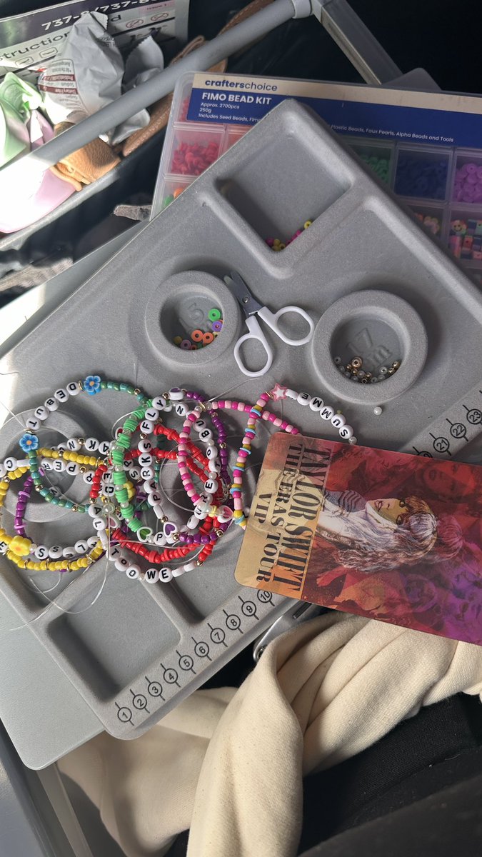 AshleighJade05's tweet photo. Managed to make 10 bracelets on the flight to Sydney 💕 @taylornation13 ✨ #SydneyTSTheErasTour @VirginAustralia ✈️ https://t.co/kLVFv7XtKM