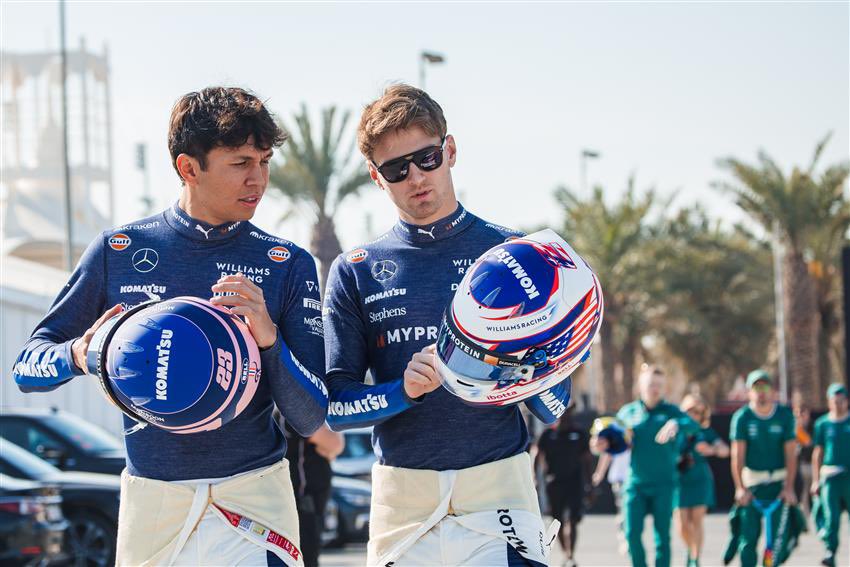 showing each other their helmets they are so dear to me