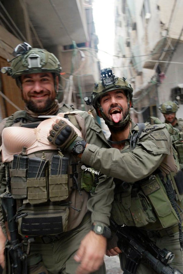 SuppressedNws's tweet photo. Just to show you how morally corrupt and depraved they are.

Israeli soldiers display lingerie belonging to a displaced/killed Palestinian woman in Khan Yonis. https://t.co/nRVvavDr89