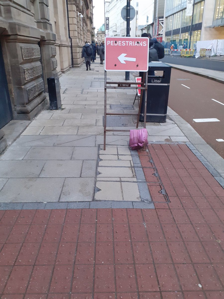 Bin + unnecessary sign + comms box = almost a quarter of the possible footway width. This is at a busy junction about 5mins away from the city centre train station. Why isn't the sign at least parallel to the bin? Details matter...
