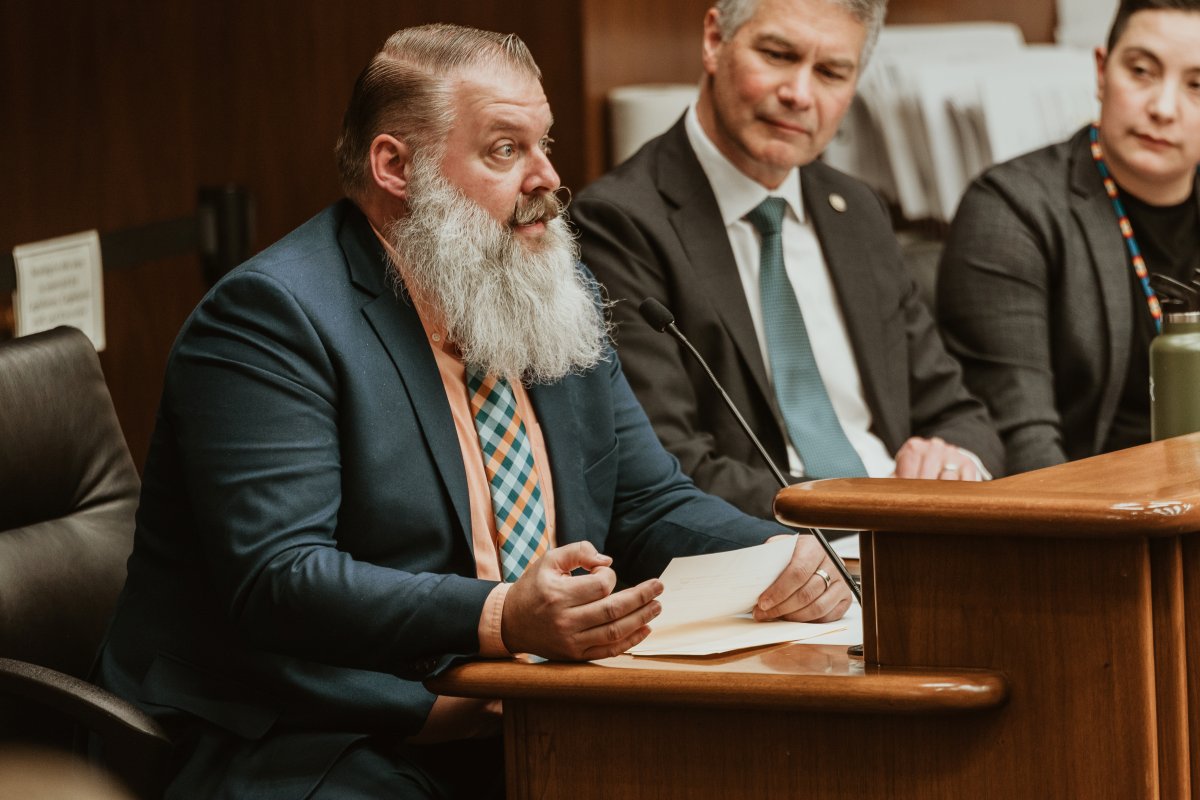 MinnesotaCities's tweet photo. Cambridge’s Evan Vogel and Aaron Berg, Minnetonka’s Julie Wischnack, and @dflightfoot testified against provisions in HF 4009 that remove public input in the residential development process and preempt local zoning/land use authority instead of supporting local housing solutions. https://t.co/Vwm5VwwydY