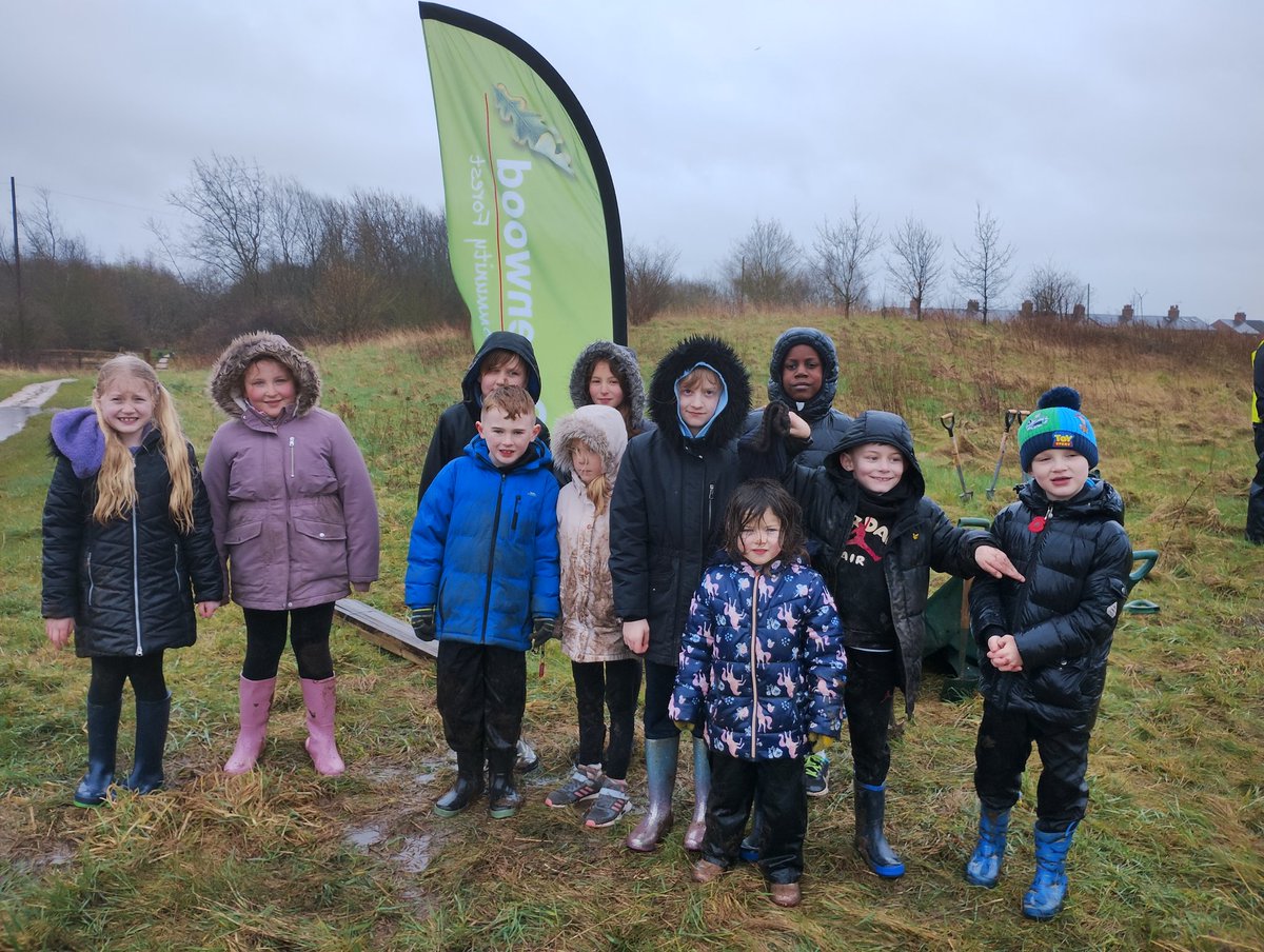 Very rainy and blustery day for tree planting @WarsopVale but Church Vale Primary were determined to come along and #plantmoretrees for #treesforclimate @DefraGovUK @CommForests