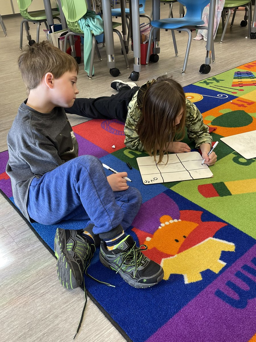 Students are working with their WICOR buddies to play high frequency word tic-tac-toe. #theMESway #AVIDatMESI