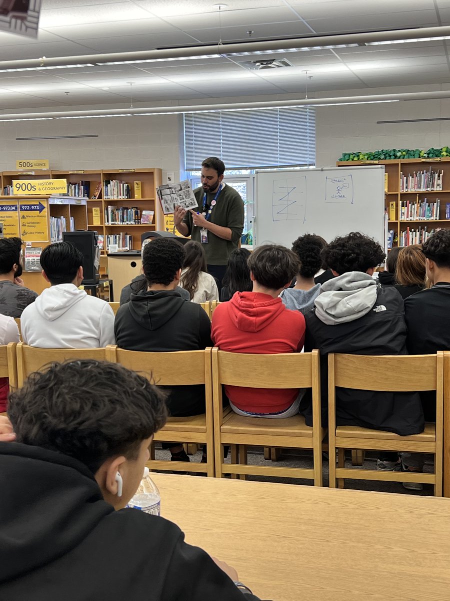 John R. Lewis High School Library tweet media