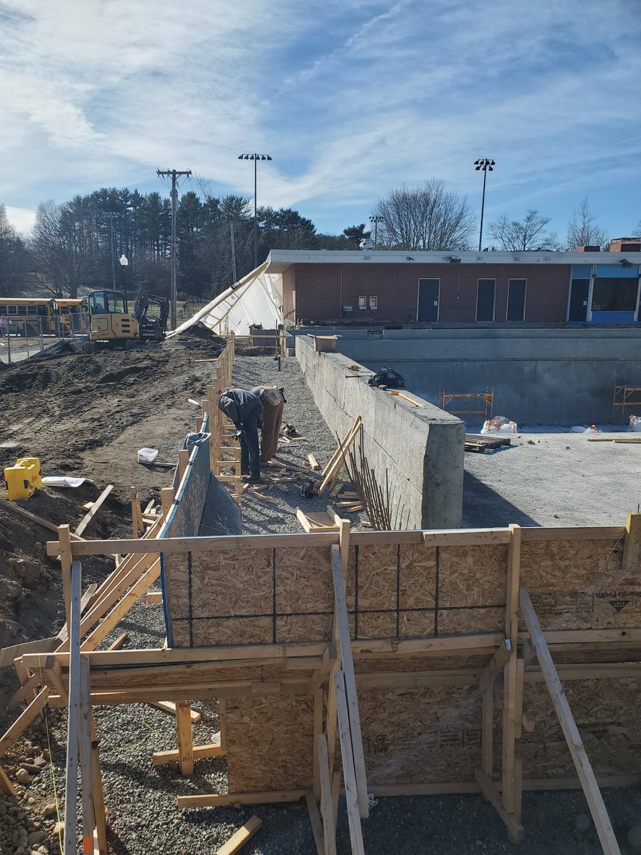 We're pouring concrete over a Gath Pool still. The competition pool is getting it's accessible ramp, and the crews are spraying shotcrete for the sidewalls of the zero-depth recreational pool.

<a href="/NewtonMAMayor/">Mayor’s Office, City of Newton</a>
