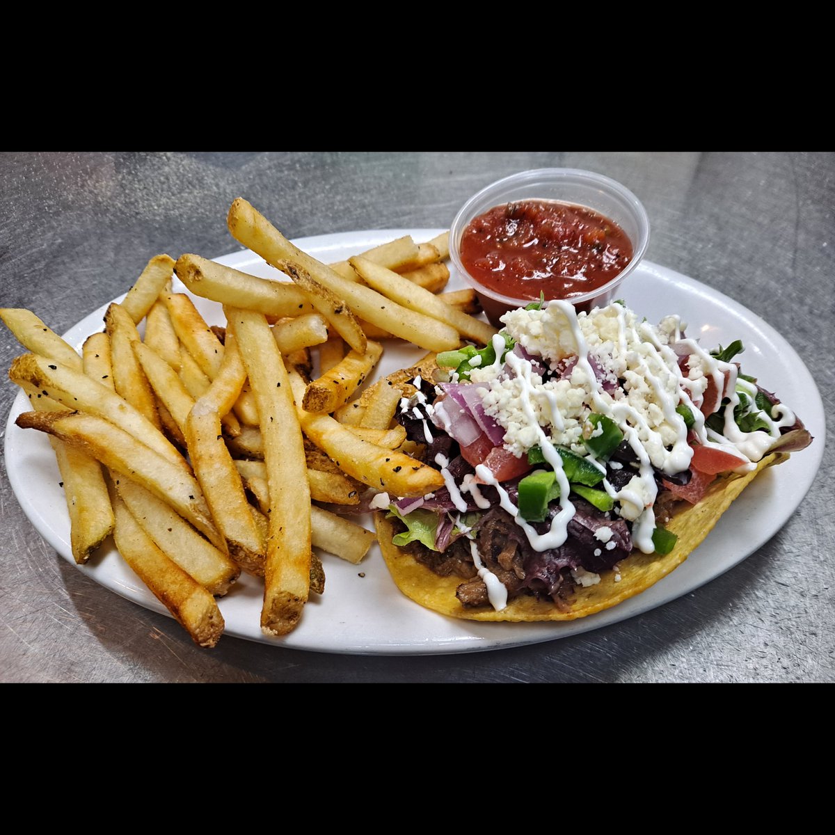 Weekly Food Special - Smoked Beef Tostada! Crispy corn tortilla, #housesmoked beef, chihuahua cheese, cotija cheese, fresh tomato, red onion, jalapenos, mixed greens tossed in our Gose vinaigrette and finished with a drizzle of crème fraiche and fire roasted salsa.
#BrewedOnBase