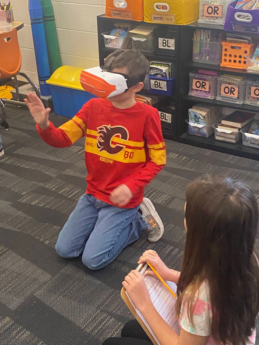 LC_Tigers's tweet photo. Using Virtual Reality at Liberty Center, students of all ages and subjects can enhance their learning experience. First graders explored animals in their habitats, while third graders improved their writing skills by describing settings from around the world.#positivelylc #lcstem https://t.co/svsvdOpaCx