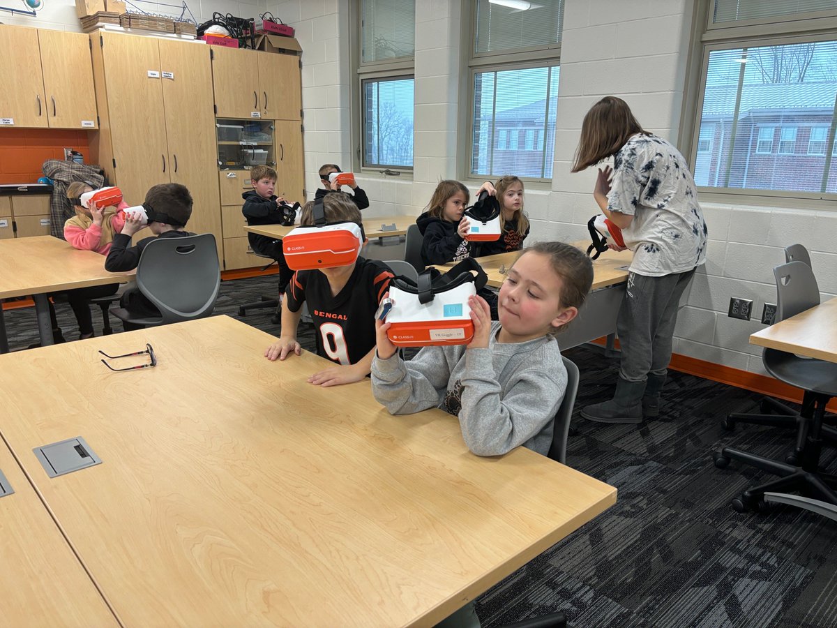 LC_Tigers's tweet photo. Using Virtual Reality at Liberty Center, students of all ages and subjects can enhance their learning experience. First graders explored animals in their habitats, while third graders improved their writing skills by describing settings from around the world.#positivelylc #lcstem https://t.co/svsvdOpaCx