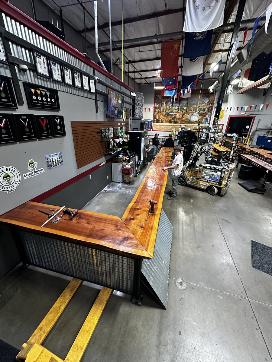 1 month ago, when we posted images #2 &amp; #3 here of the main bar getting a bit longer with the caption “Who wants to take a guess at what’s going on here…? 🍻🛠️🍻” If you guessed: Putting in a space where you can get pizza for lunch, you guessed correctly. 🍕🍺🍕