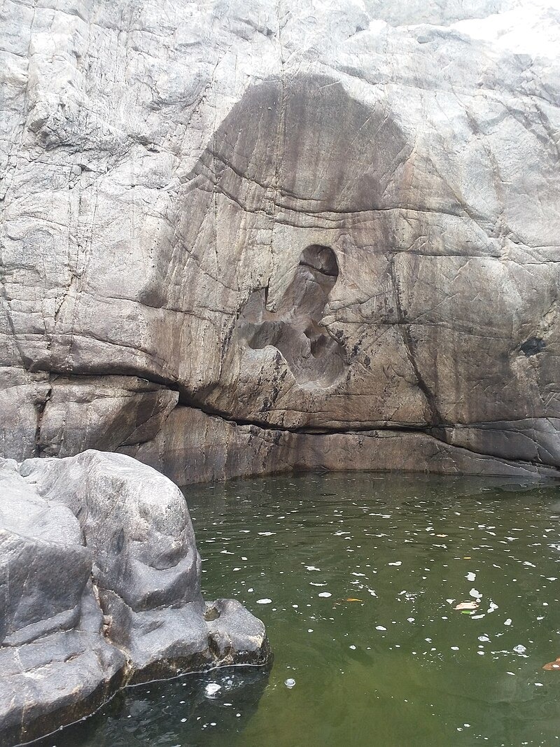 Whirlpool damaged mountain portion in Hogenakkal Falls in Tamil Nadu . Can we call this Nature's Phallacy?
