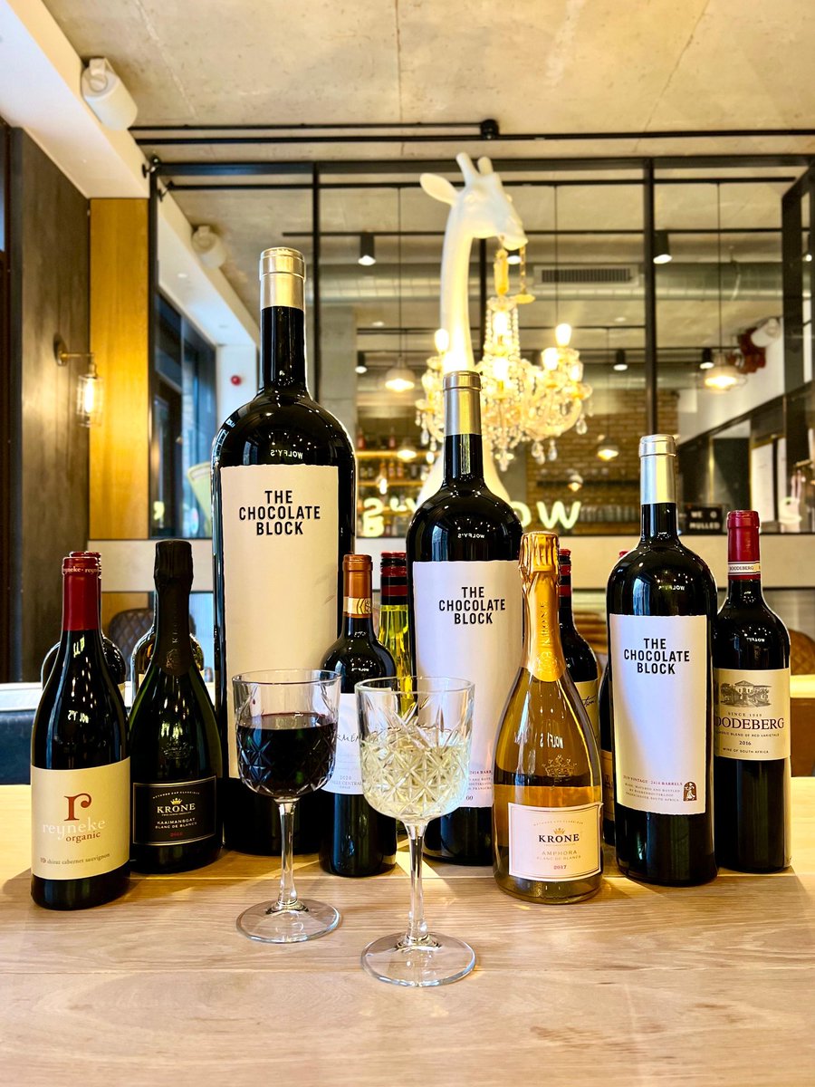 WolfysBar's tweet photo. Satisfy your cravings with the bestselling drink at Wolfy's Bar - The Chocolate Block! Made with a blend of Boekenhoutskloof Syrah, Grenache, Cinsault, Cabernet Sauvignon, and Viognier. #chocolateblock #wineoclock #wolfysbar 🍾 https://t.co/psWA65F8eM https://t.co/OHzmI08wJ6