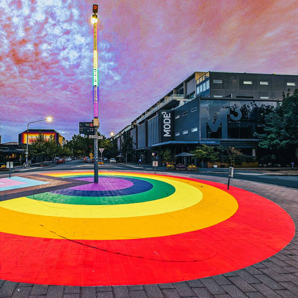 The revitalised Rainbow Roundabout in Braddon.
It includes a wedge shape with colours representing the transgender community (white, pink and light blue) and communities of colour (black and brown) and was completed last month. #visitcanberra