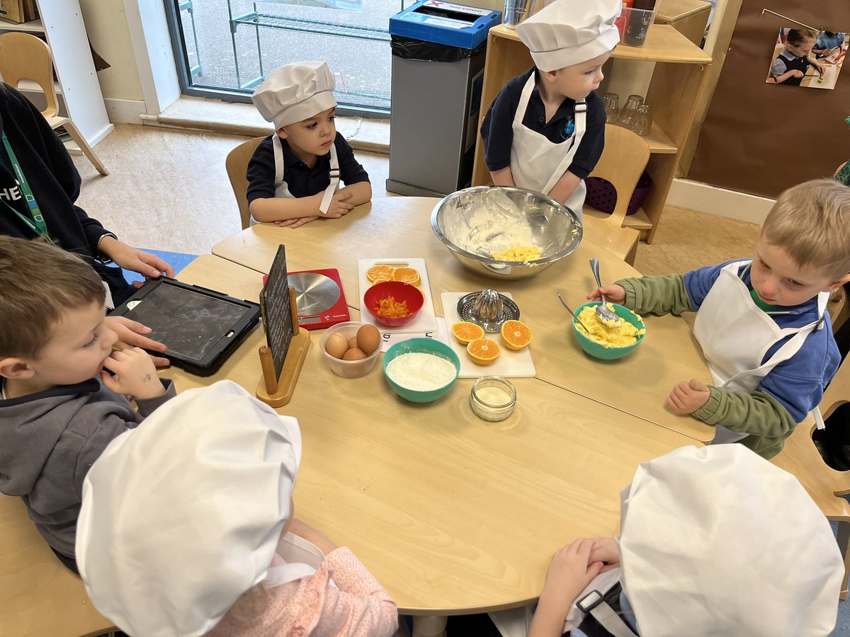 Making some orange cupcakes using a range of mathematical language whilst measuring out the ingredients 🧁🍊