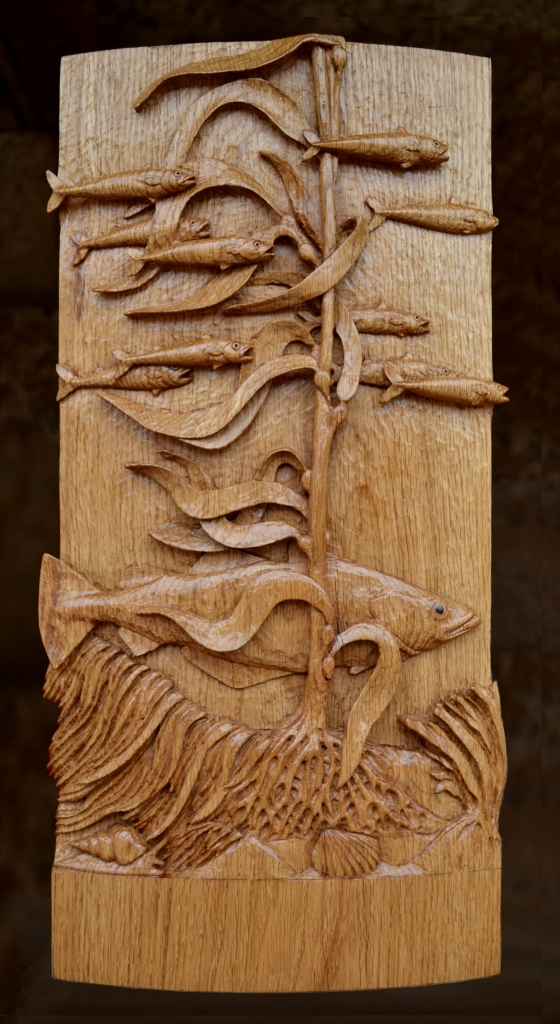 Revealing the third (and final) leg of my father's remarkable solid oak 'Rockpool Table'
I particularly love the school of little fish weaving in and out of the kelp, and the texture of the painstakingly hand-chiselled background. 
#otterman #rockpool #ocean #carving #woodcarving