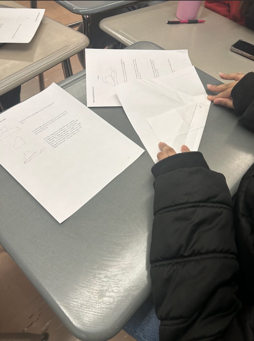 Dovermath's tweet photo. Mrs. Roldan's Dual Enrollment Statistics students are studying (we promise!) by testing which style of paper airplane flies the farthest! @PublicDover @DoverHSNJ @wpunj_edu https://t.co/8naDBDWprK