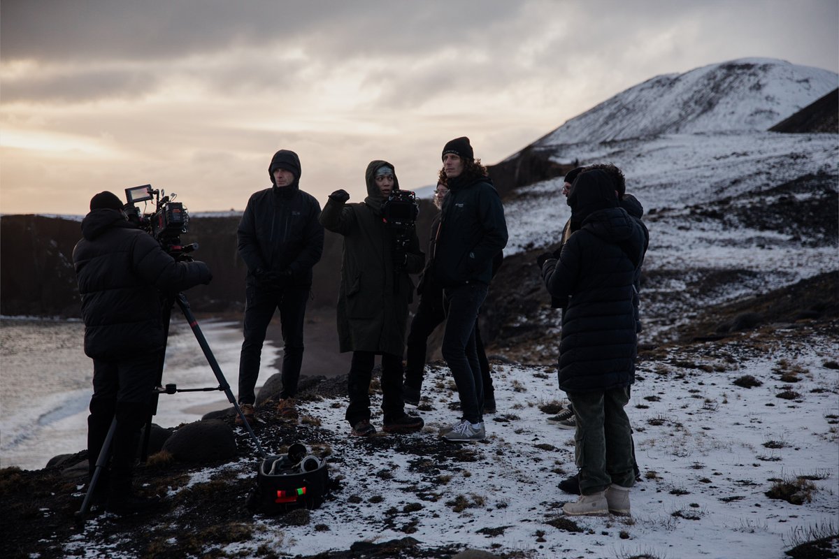 Director @Andrew_Morgan and Camera Operator Helen Cassel in Grindavik, Iceland. The crew getting put to work with frozen gear and 30 mph mountain wind 🥶